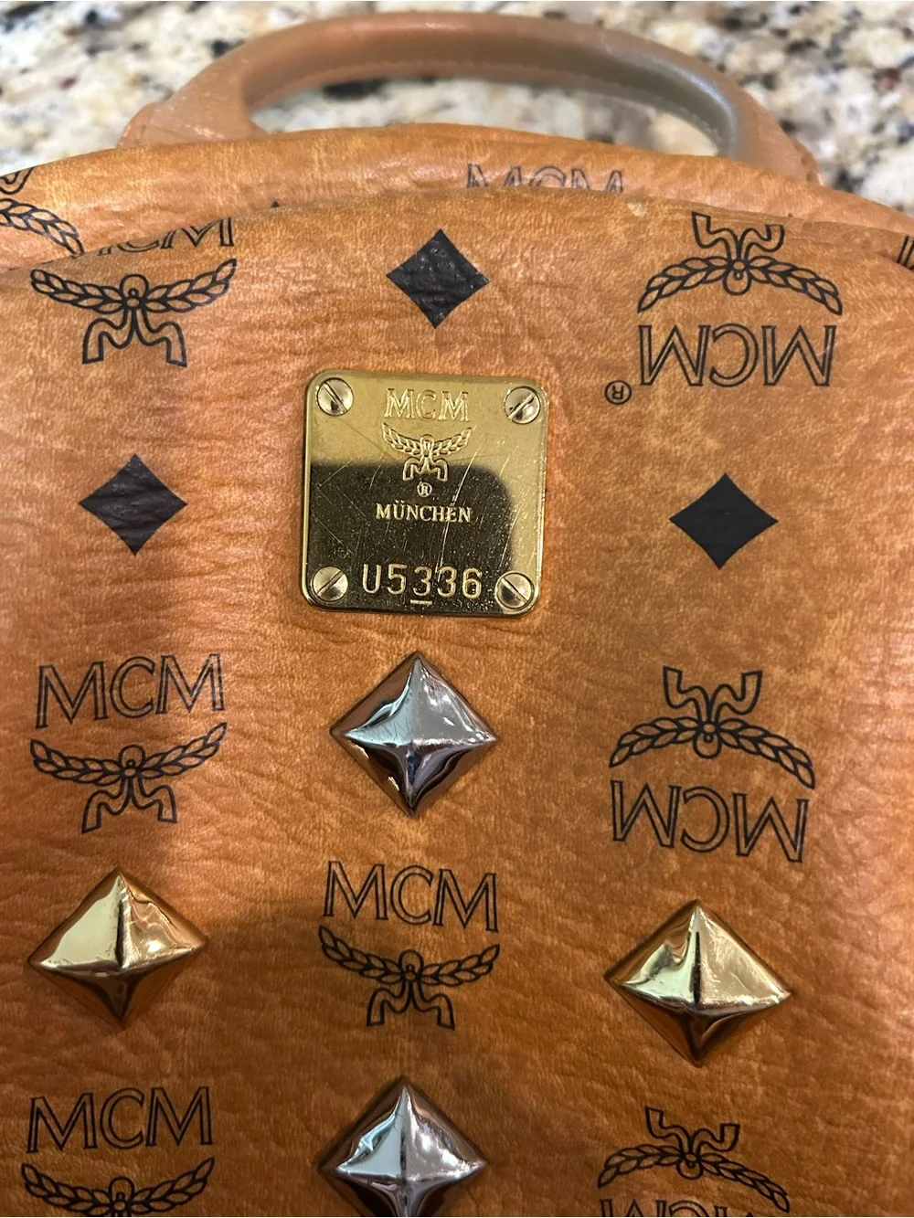 MCM Cognac Visetos Backpack Large with mcm bone bag charm and coa card.